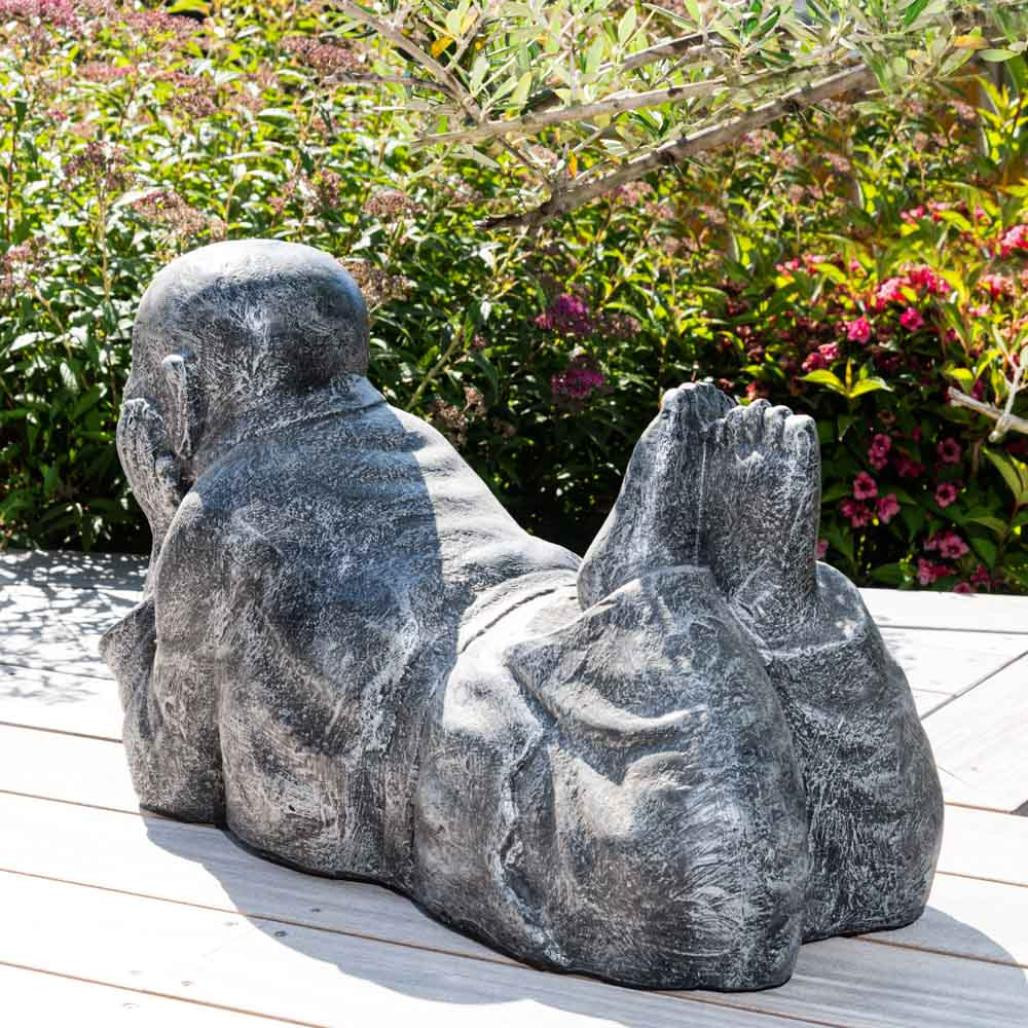 Estatua monje tumbado pàtina gris Estatua monje tumbado pàtina gris